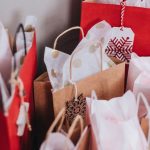 Holiday Shopping - shallow focus photography of paper bags