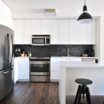 Appliances Buying - gray steel 3-door refrigerator near modular kitchen
