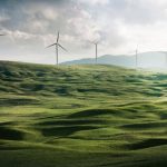 Travel Savings - wind turbine surrounded by grass