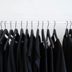 Clothing Shopping - black clothes hanged in rack
