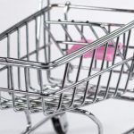 Cashback Shopping - A small pink shopping cart with a handle