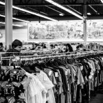 Wholesaler Deals - grayscale photography of people inside a clothing shop