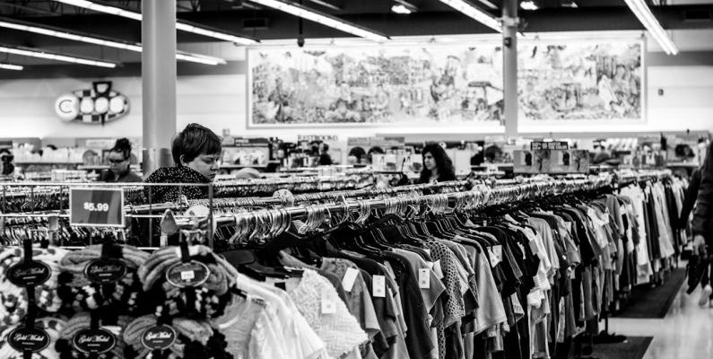 Wholesaler Deals - grayscale photography of people inside a clothing shop