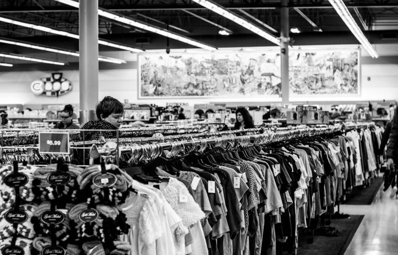 Wholesaler Deals - grayscale photography of people inside a clothing shop