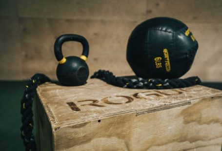 Membership Benefit - black metal kettle bell and heavy bag