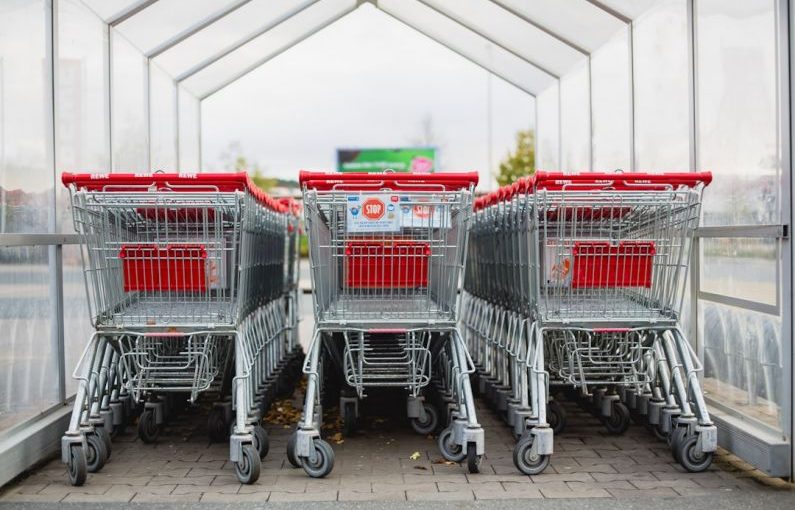 Grocery Wholesale - gray and red shopping carts