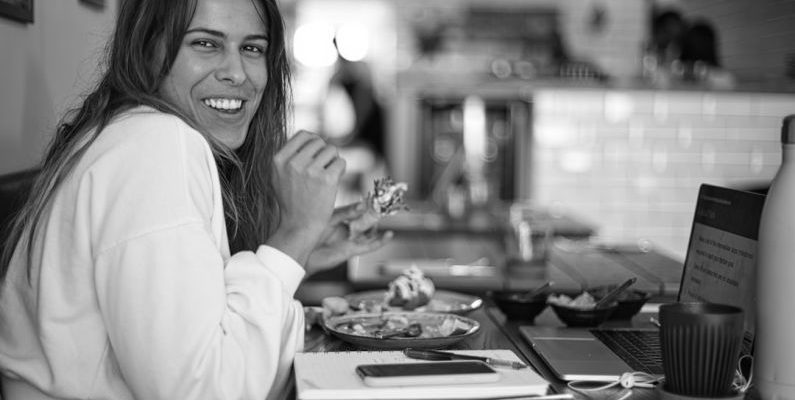 Seasonal Eating - woman in white long sleeve shirt smiling